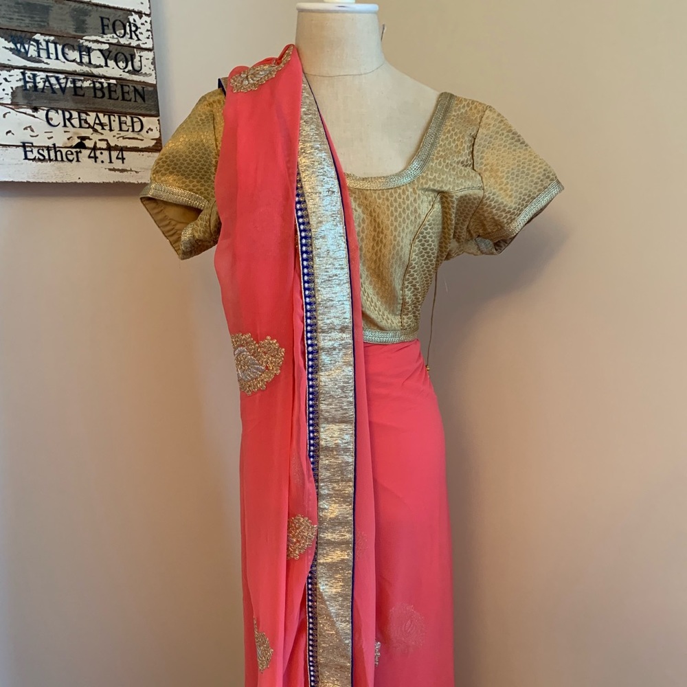 Lovely Coral and gold embroidered sari